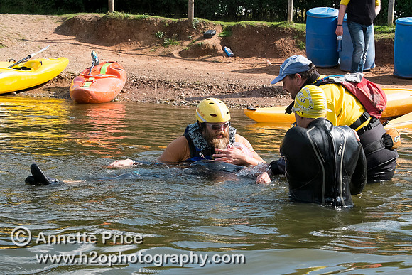 On-the-water. Training kayak paddlers to rescue swimmers