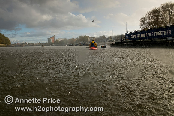 Hail stones landing on the River Thames, Putney, London.