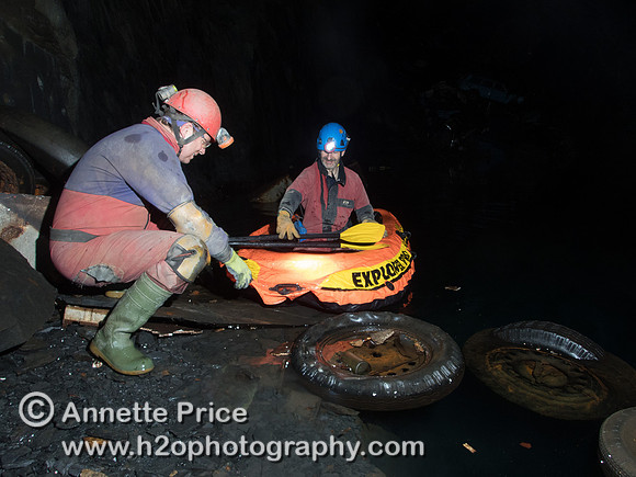 Neil Montgomery (left) steadying the boat for Peter Hamilton ((right) Gaewern Slate Mine.