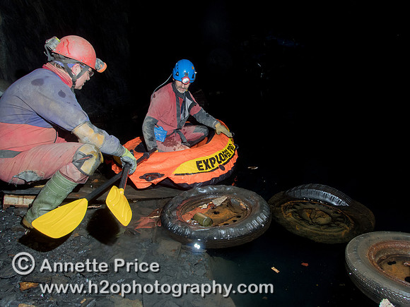 Neil Montgomery (left) steadying the boat for Peter Hamilton ((right) Gaewern Slate Mine.