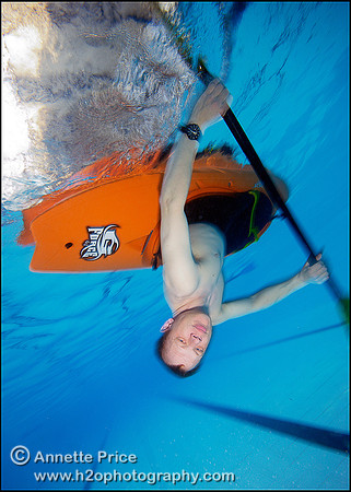 Paddle rolling a kayak - from underwter
