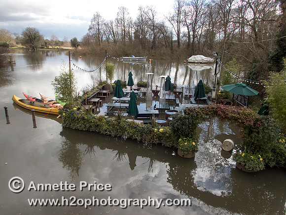 High water on the River Thames. White Swan Pub - Twickenham, London.