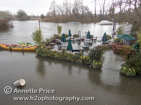 High water on the River Thames. White Swan Pub - Twickenham, London.