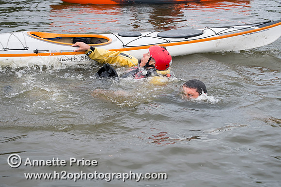On-the-water. Training kayak paddlers to rescue swimmers