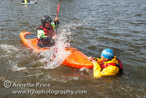 On-the-water. Training kayak paddlers to rescue swimmers