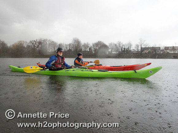 Kayaking on the River Thames near Chiswick, in the rain. London
