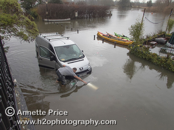 High water on the River Thames. White Swan Pub - Twickenham, London.