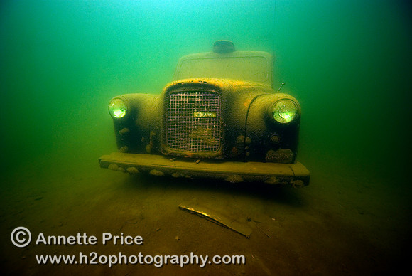 Underwater taxi photographed in a lake in Wraysbury.  The taxi is at a depth of 6 meters.