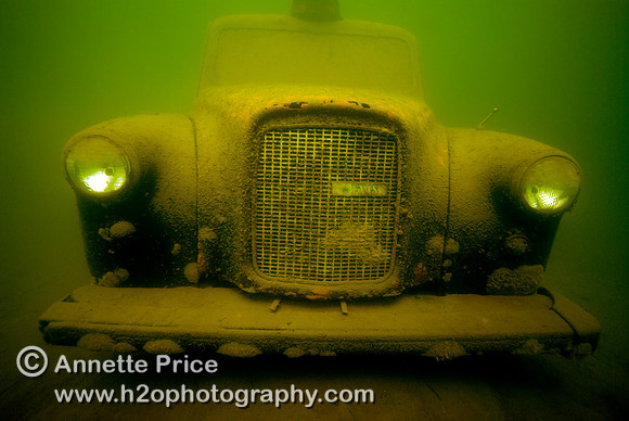Underwater taxi photographed in a lake in Wraysbury.  The taxi is at a depth of 6 meters.