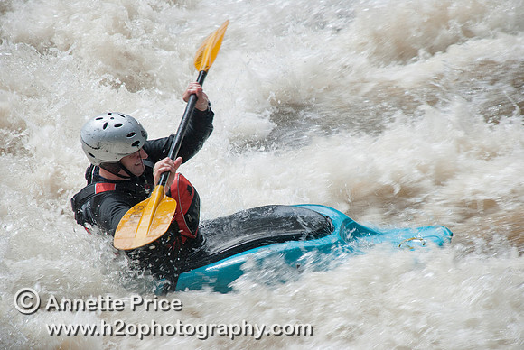 Kayaking on Shepperton Weir, River Thames, UK