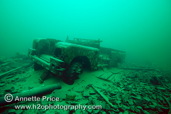 Submerged Series 3 Land Rover at a depth of  22 meters at the Stoney Cove National Diving Center in Leicestershire.