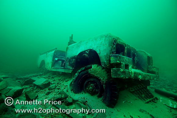 Submerged Series 3 Land Rover at a depth of  22 meters at the Stoney Cove National Diving Center in Leicestershire.