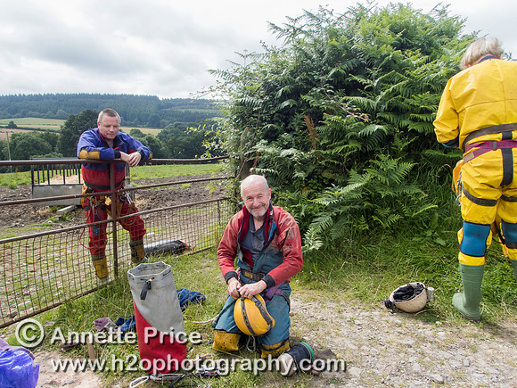 Cavers getting ready to enter Slaughter Stream Cave, South Wales, UK