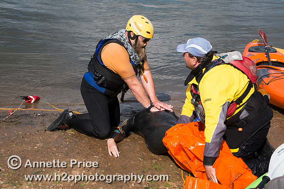 On-the-water. Training kayak paddlers to rescue swimmers