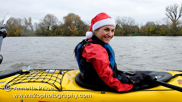 Paddlers on the R. Thames paddling to the Ship pub in Mortlake for Christmas Dinner
