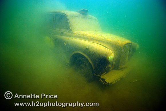 Underwater taxi photographed in a lake in Wraysbury.  The taxi is at a depth of 6 meters.