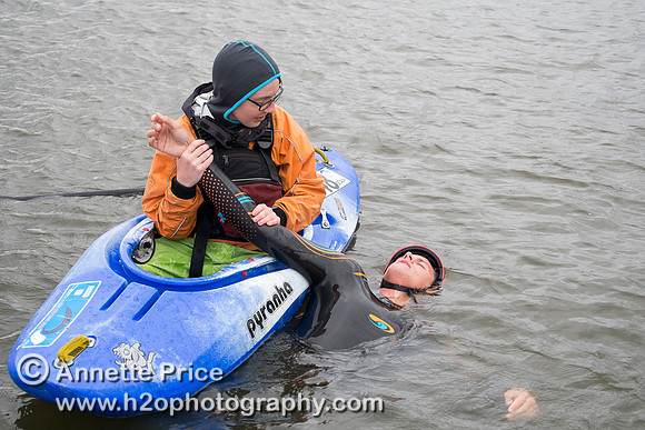 On-the-water. Training kayak paddlers to rescue swimmers