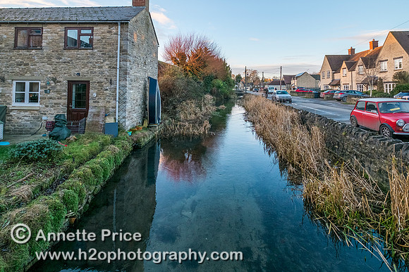Ashton Keynes village. This is the first village which the River Thames flows through.