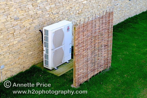 The air source heat pump (ASHP). The Habitat House. Lower Mill Estate, Cotswolds.