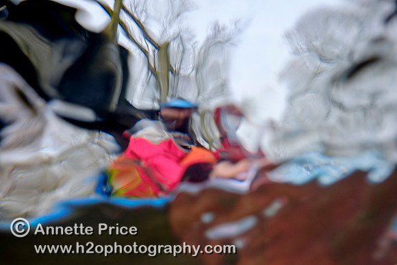 Seen from underwater - Paddler Mark Villa Vercella on the River Thames at Lechlade.