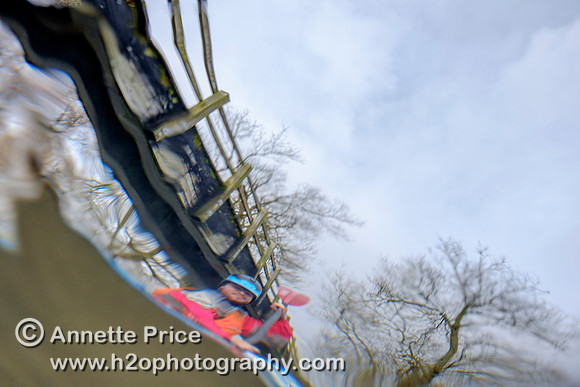 Seen from underwater - Paddler Mark Villa Vercella on the River Thames at Lechlade.