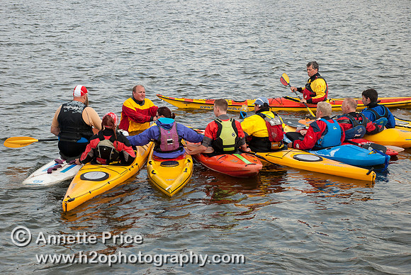 On-the-water. Training kayak paddlers to rescue swimmers