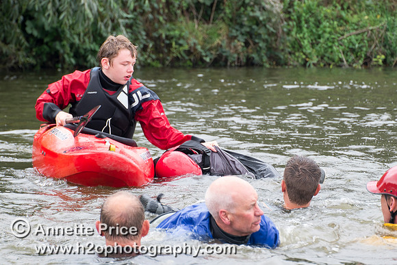 On-the-water. Training kayak paddlers to rescue swimmers