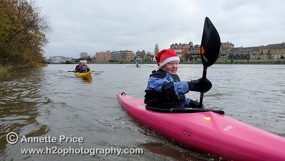 Guy Douglas paddling on the R. Thames to the Ship pub in Mortlake for Christmas Dinner