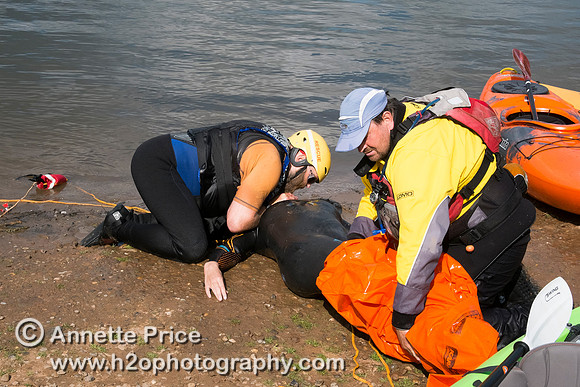 On-the-water. Training kayak paddlers to rescue swimmers