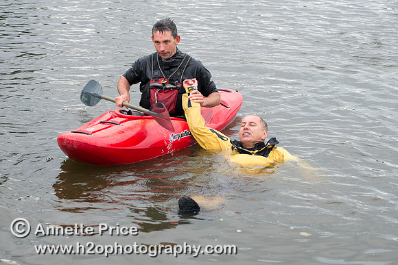On-the-water. Training kayak paddlers to rescue swimmers