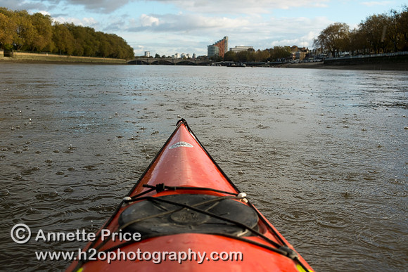 Hail stones landing on the River Thames, Putney, London.
