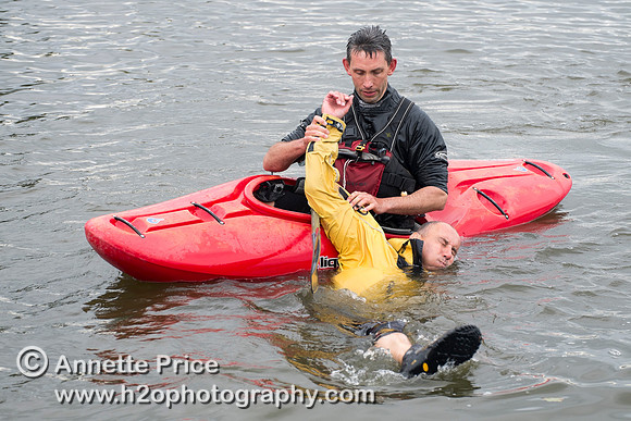 On-the-water. Training kayak paddlers to rescue swimmers