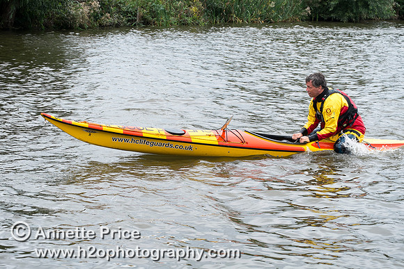 On-the-water. Training kayak paddlers to rescue swimmers