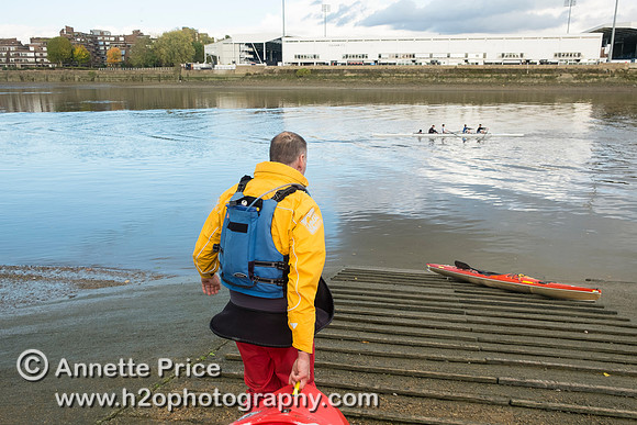 Carrying the kayaks to the water.  River Thames, Barn Elms, London