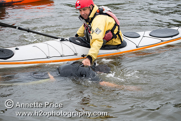 On-the-water. Training kayak paddlers to rescue swimmers