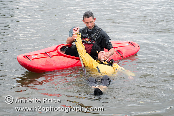 On-the-water. Training kayak paddlers to rescue swimmers