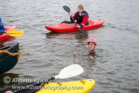 On-the-water. Training kayak paddlers to rescue swimmers