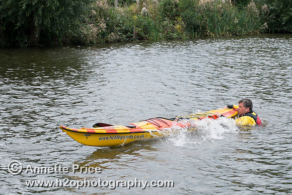 On-the-water. Training kayak paddlers to rescue swimmers