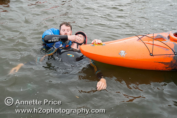 On-the-water. Training kayak paddlers to rescue swimmers