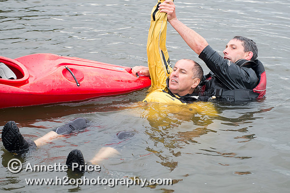 On-the-water. Training kayak paddlers to rescue swimmers