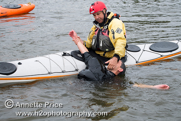 On-the-water. Training kayak paddlers to rescue swimmers